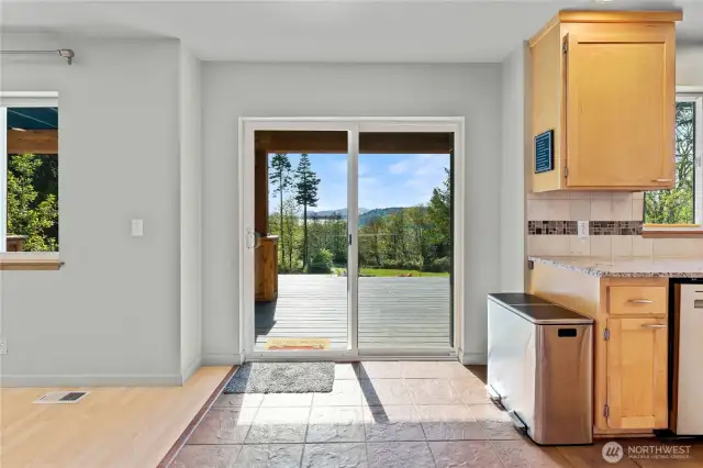 Sliding door off the kitchen opens to covered porch