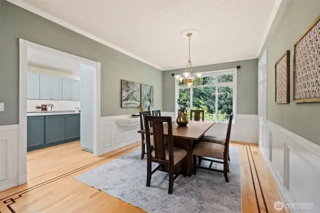 Formal dining room, adjoins the kitchen, with hardwood floors and can easily accommodate a larger table.