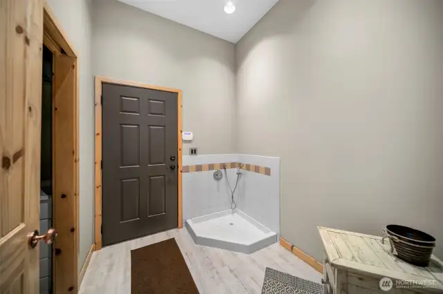 Half bathroom plus boot washing station.