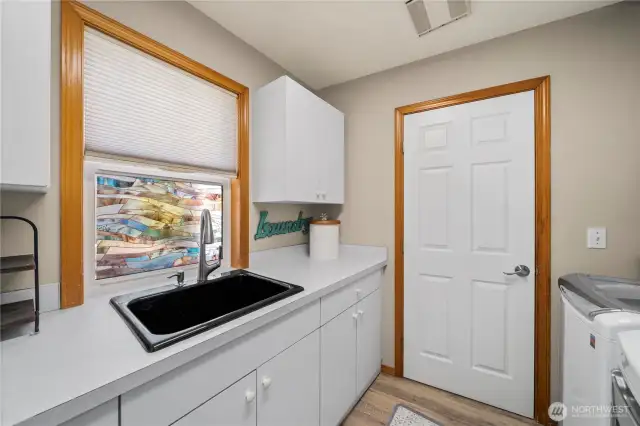Laundry room with outside access