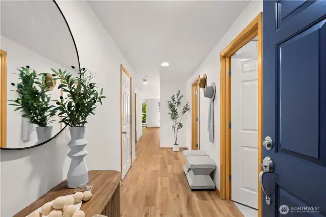 Entry into the unit. The private laundry room is located through the right door.