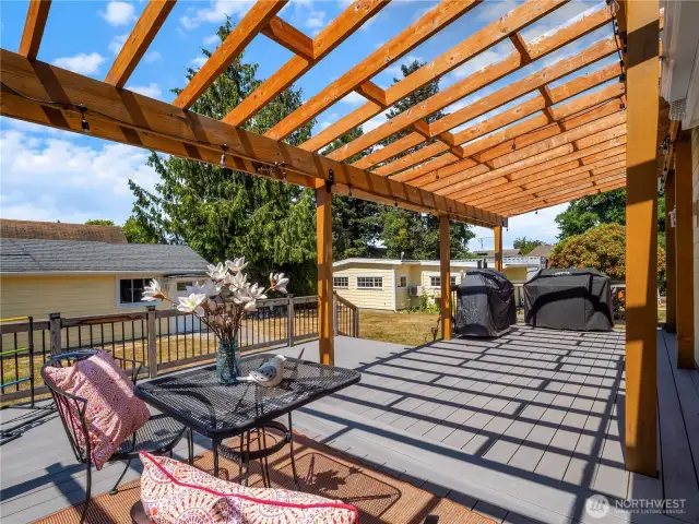 Ideal space for entertaining and unwinding. The large deck is spacious enough for both a dining area and informal living. From the deck is the detached garage and the second dwelling, which could easily be converted into an ADU.