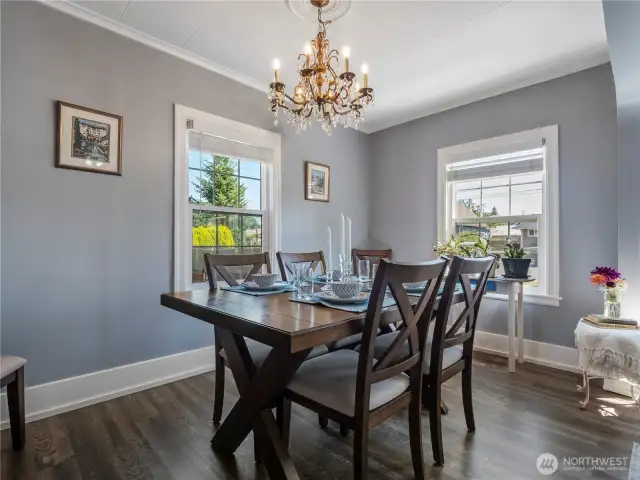 Another view of the dining room. This space can easily accommodate a take and chair to seat 8 people.