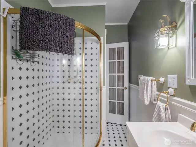 The unique shower maximizes the space in the bathroom.