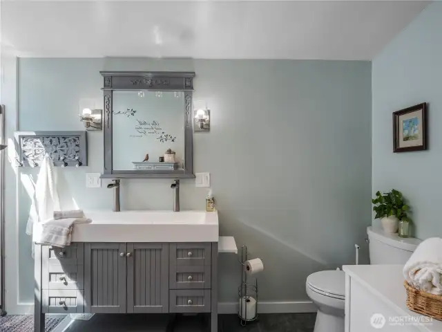 Stunning primary bathroom! Calm and refreshing color palette.