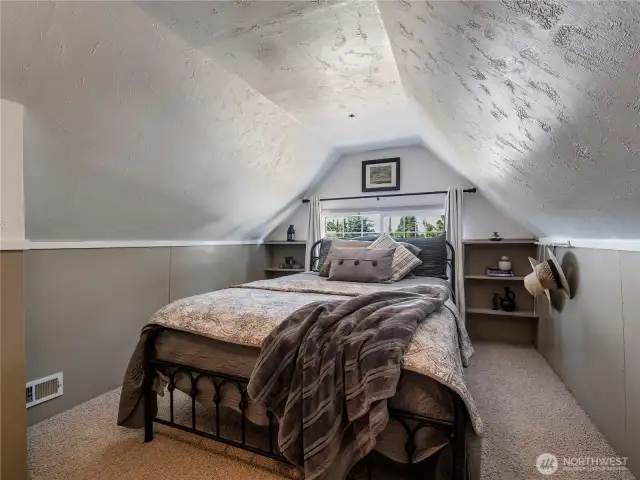 Upstairs you'll find two additional bedrooms with an added surprise...