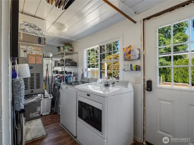 Laundry room. Access to the side yard.