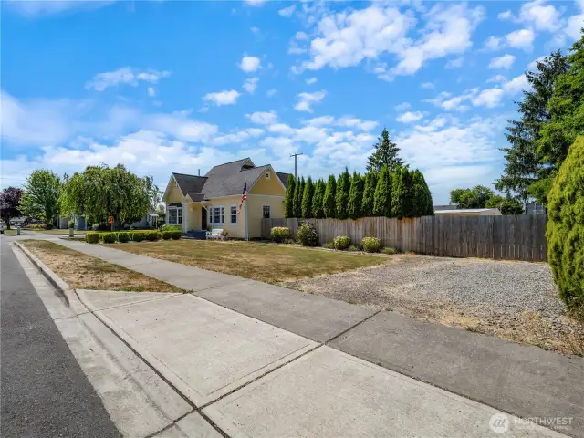 Additional parking. Access the gates double doors to enter the backyard.