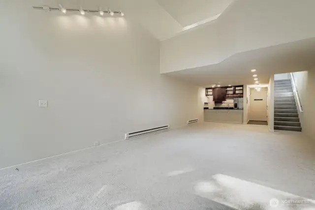 Living room expanse, stairs up to the loft Primary