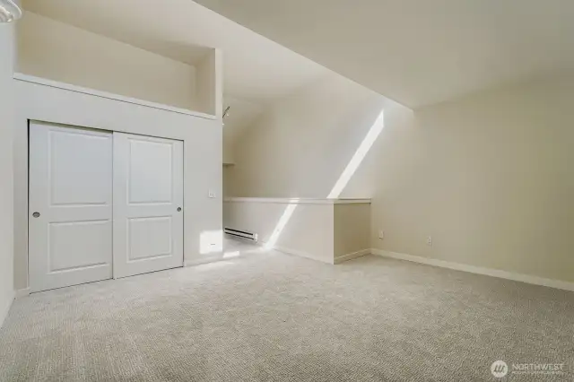 Primary Bedroom closet and upper storage