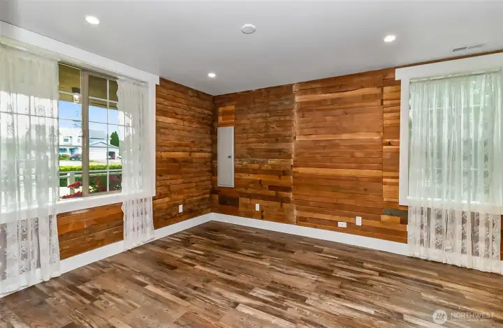1st bedroom on main floor. Love all the natural wood that is in here.