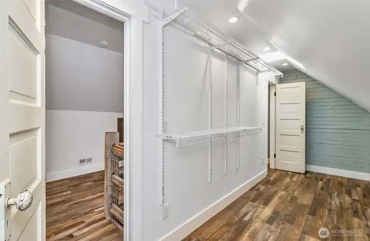 Between the primary bedroom & bath is a huge walk-in closet!