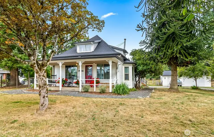 Check out the 3 car garage/shop just off the side of the house.  This home has all you could imagine for country living with all the modern amenities.