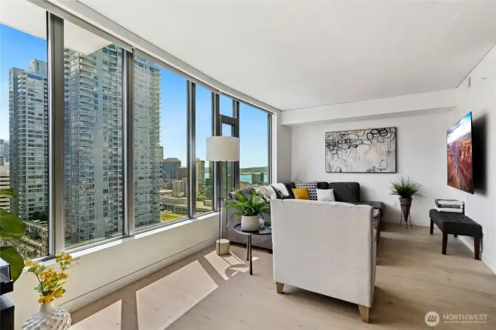 All window treatments are included. You will enjoy privacy on the 21st floor while still enjoying city activity and the breathtaking views of the Pudget Sound, mountains and city lights.