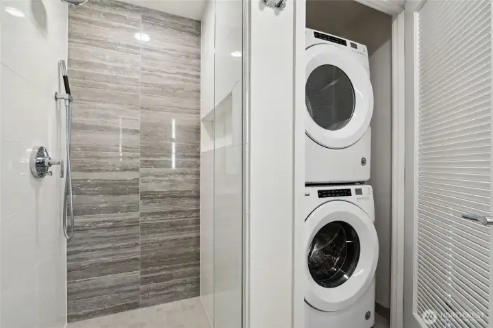 In unit laundry is tucked tastefully in its own closet.