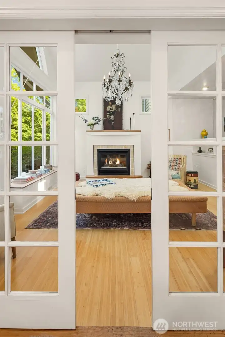 Gorgeous pocket doors usher you from library to living.