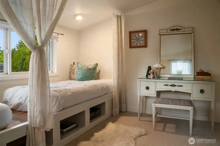 The second floor bedroom with built in beds and cubbies. Or open it up to the attached playroom and create a gorgeous primary suite.