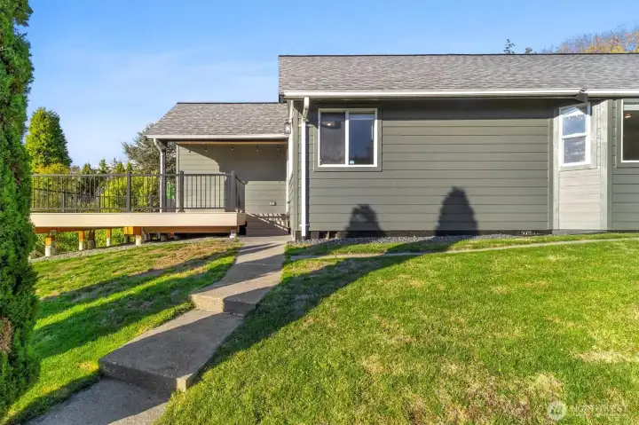 Front entry view displaying the charming elevation and fresh exterior design.