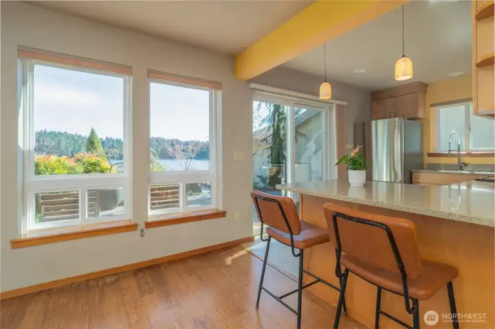 The kitchen overlooks the outdoor terrace with a beautiful fountain and easy access to the beach. The kitchen overlooks the outdoor terrace with a beautiful fountain and easy access to the beach.