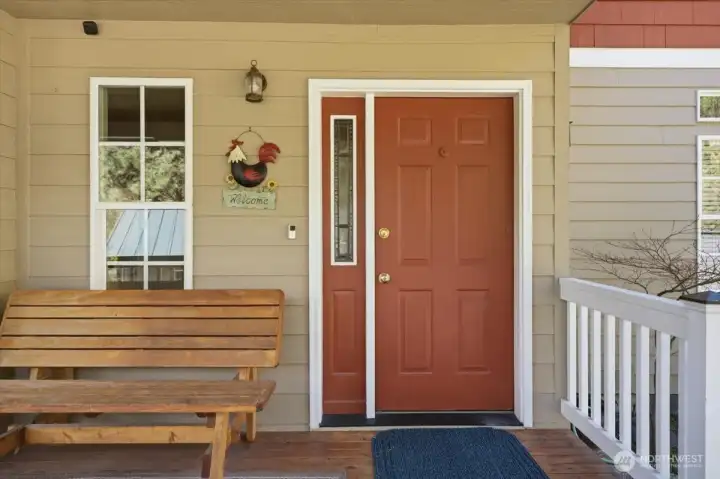 Front door off of wrap-around deck.