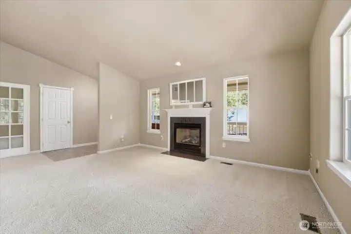 Living room with propane fireplace.