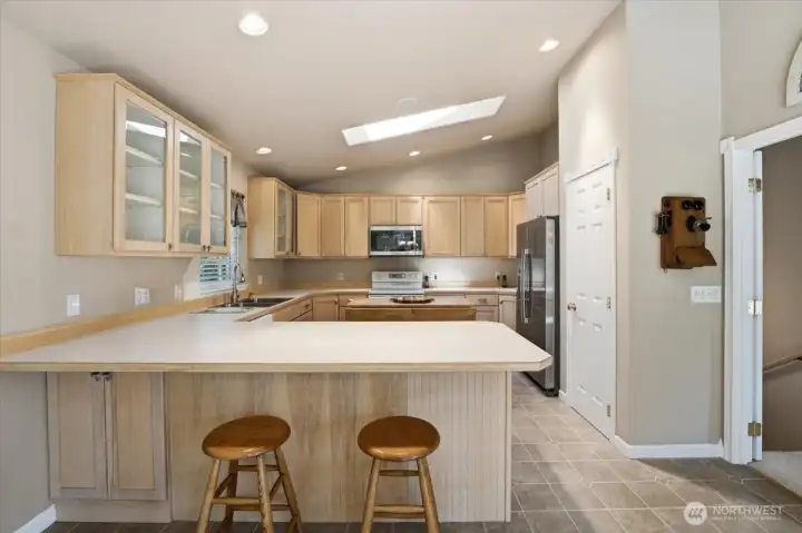 Kitchen with lots of cabinets and counter space for baking, cooking, or entertaining.