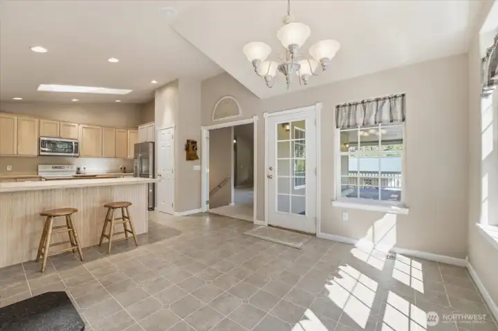 Dining room and kitchen.