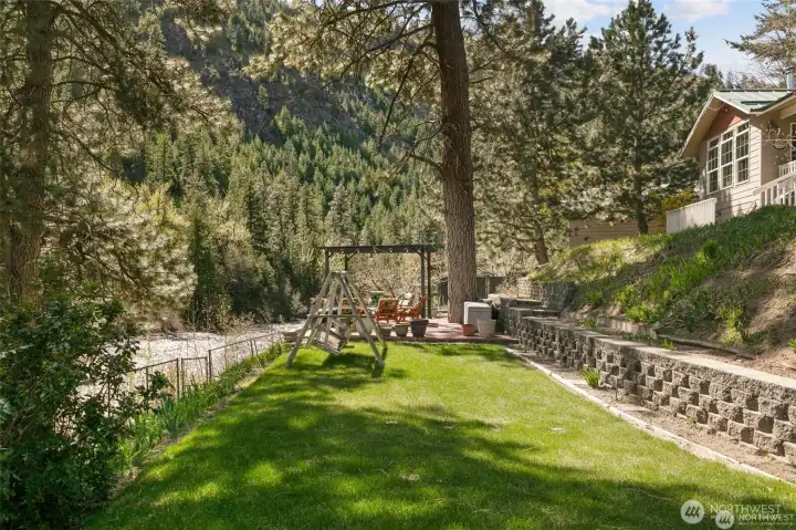 Lower level by river. Property is all fenced.