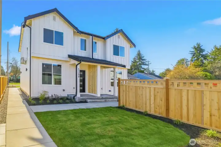Modern new construction with private yard and clean, contemporary design