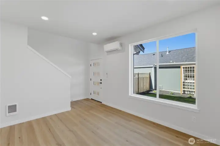 Light-filled living space with large windows and open layout