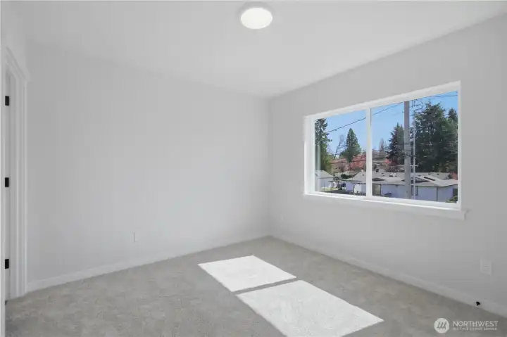 Primary suite with great natural light and comfortable layout