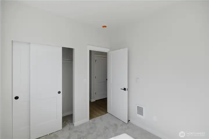 Additional upstairs bedroom with functional layout