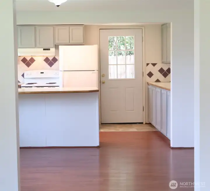 View to the kitchen from the living room creates a semi-open concept