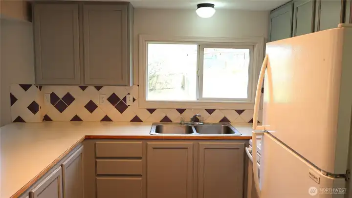 You can admire your apple tree from your kitchen window.