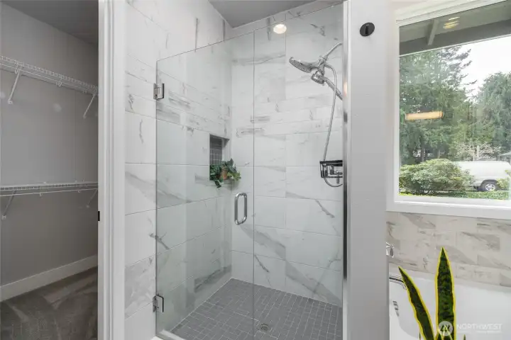 Primary bath tiled walk-in shower