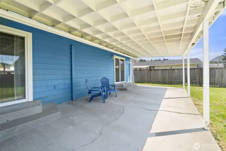 Covered Patio leading to the fenced backyard.