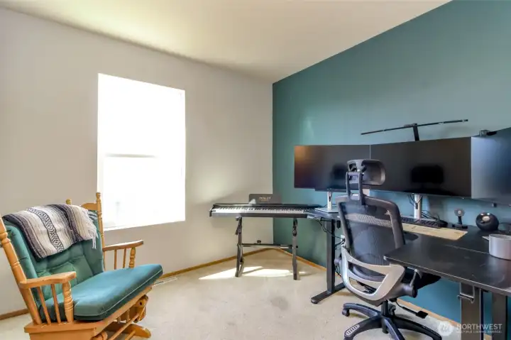 This upstairs office is very private! It's  Located as a separate area within the master bedroom making it very quiet even with other activities going on in the rest of the house or convert it a massive walk in closet or 4th bedroom!