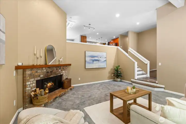 Open to the kitchen and dining room.