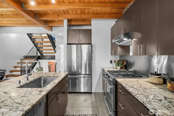 Well-appointed kitchen blending style, sleek stainless appliances, functionality, and contemporary design. Well-appointed kitchen blending style, sleek stainless appliances, functionality, and contemporary design.