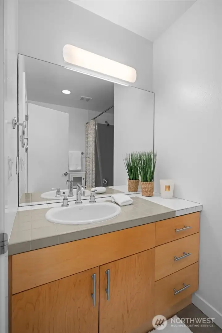 Contemporary full bath featuring clean lines, generous storage, and timeless finishes. Contemporary full bath featuring clean lines, generous storage, and timeless finishes.