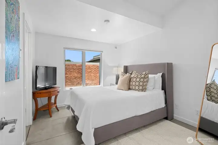 Light-filled bedroom offering comfort, flexibility, and a peaceful retreat. Light-filled bedroom offering comfort, flexibility, and a peaceful retreat.