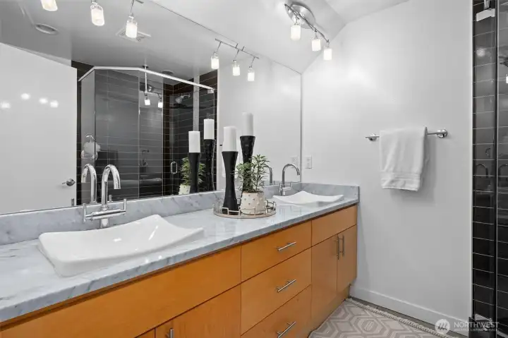 Contemporary bath featuring clean lines, generous storage, and timeless finishes. Contemporary bath featuring clean lines, generous storage, and timeless finishes.
