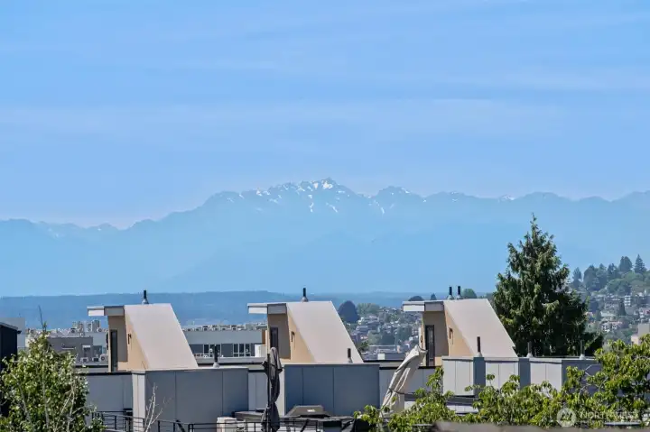 Rare city and mountain vistas elevate the home’s rooftop experience. Rare city and mountain vistas elevate the home’s rooftop experience.