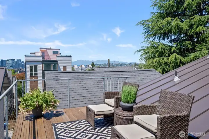 Expansive rooftop retreat with sweeping city views, perfect for entertaining or relaxing above Capitol Hill. Expansive rooftop retreat with sweeping city views, perfect for entertaining or relaxing above Capitol Hill.
