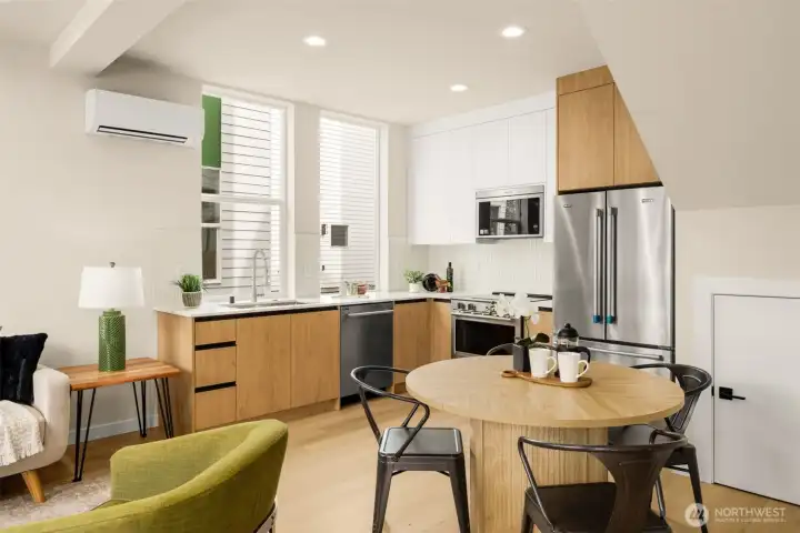 Perfect transition from the main living area toward the dining and kitchen spaces. (photos are of model home, same community similar finishes)