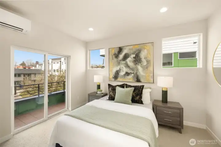 Spacious upper-level bedroom featuring clean design and pristine neighborhood views. (photos are of model home, same community similar finishes)