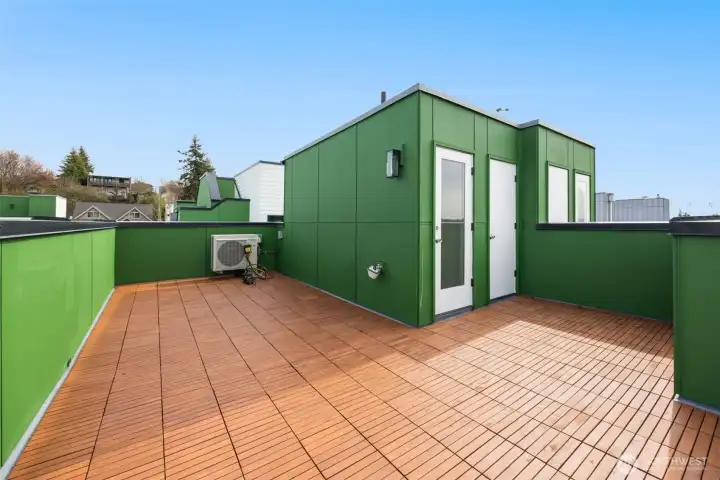 Expansive rooftop deck capturing sweeping neighborhood views—perfect for outdoor entertaining. (photos are of model home, same community similar finishes)