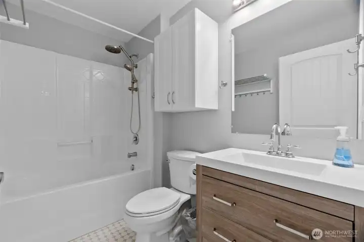 Main Guest bath includes an LED sink faucet that lights up at the rim when used!