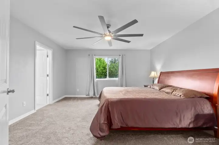 Primary bedroom (3) with ceiling fan