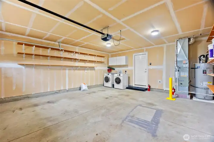 Laundry located in 2-car garage